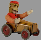 Schucco monkey in car