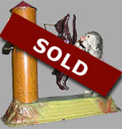 Guntherman, hand painted tin windup toy